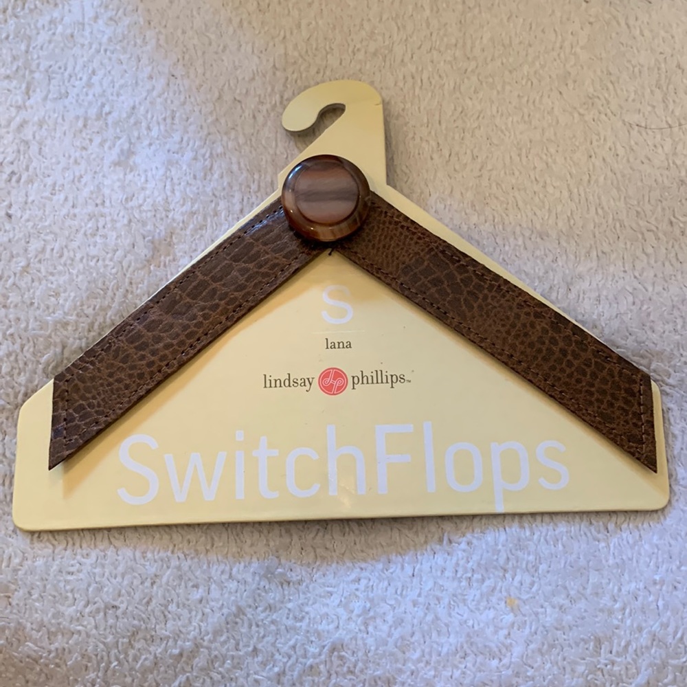 BRAND NEW pair of “Lana” style SwitchFlops by Lindsay Phillips. Size Small.